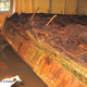 Inside face of ship’s timbers. The hull undergoing spray treatment by Charles Fithian and his staff at the State of Delaware Historical and Cultural Affairs.